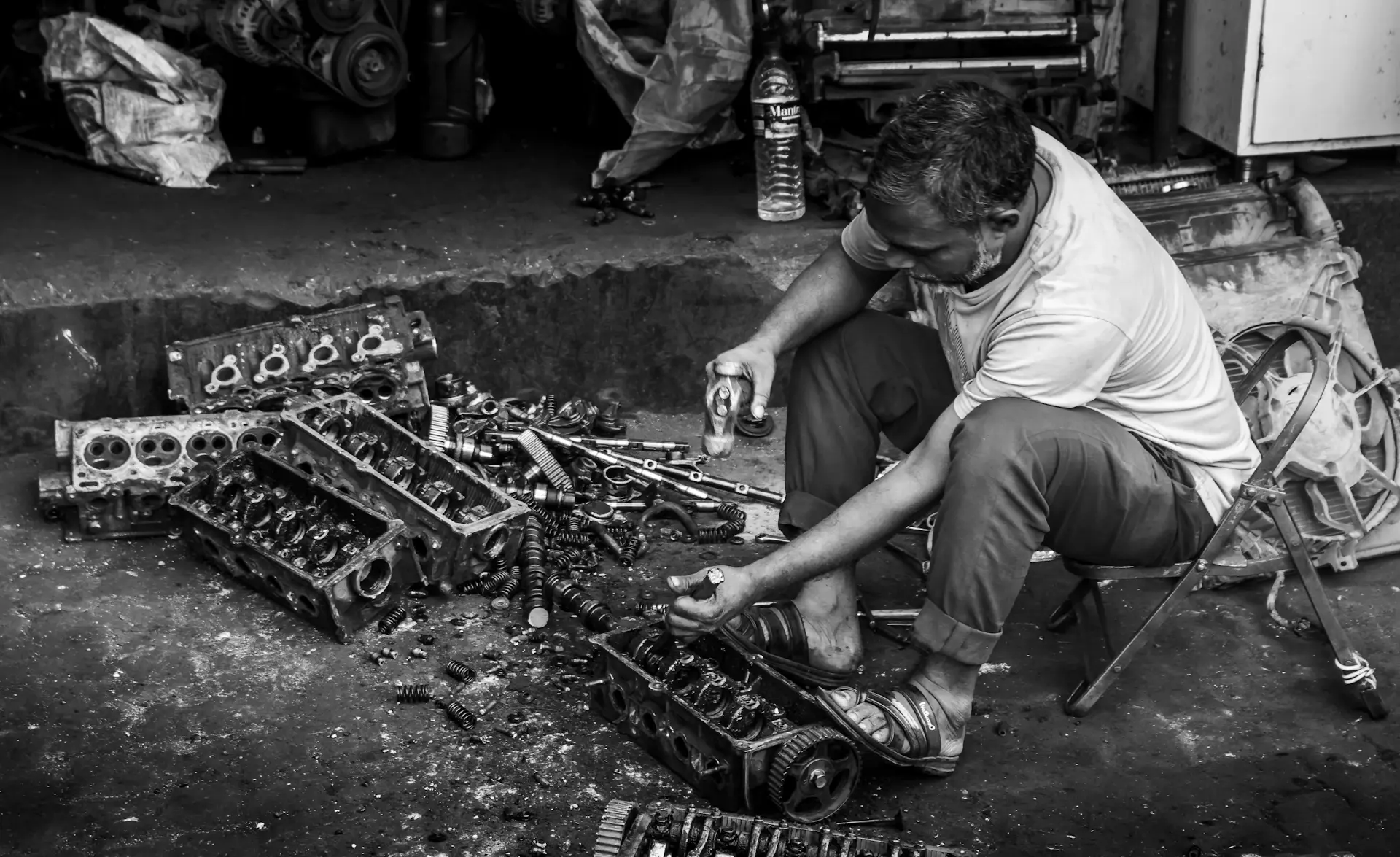 An engine being assembled by hand in the workshop