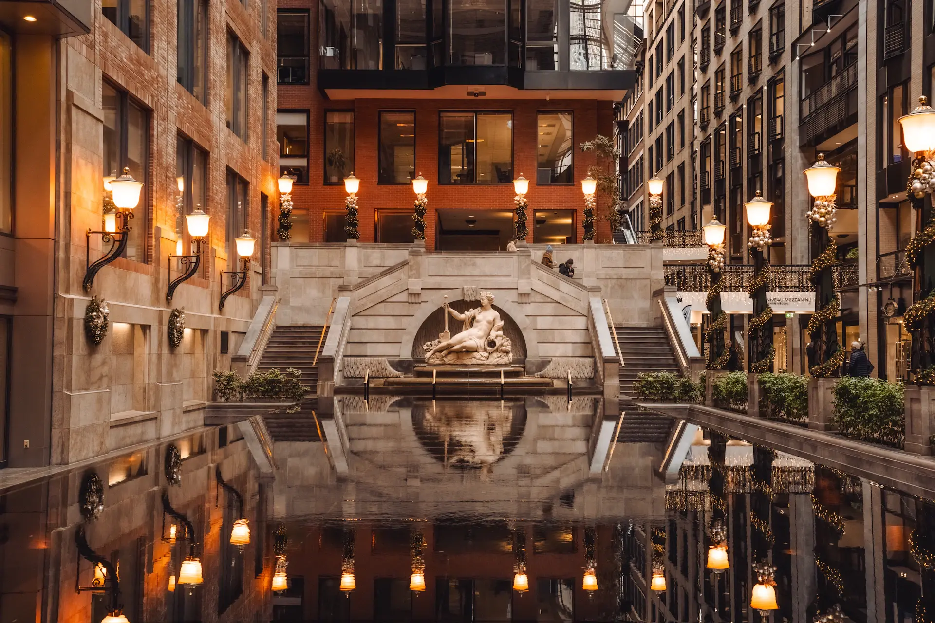 Sunlit interior courtyard with reflecting pool