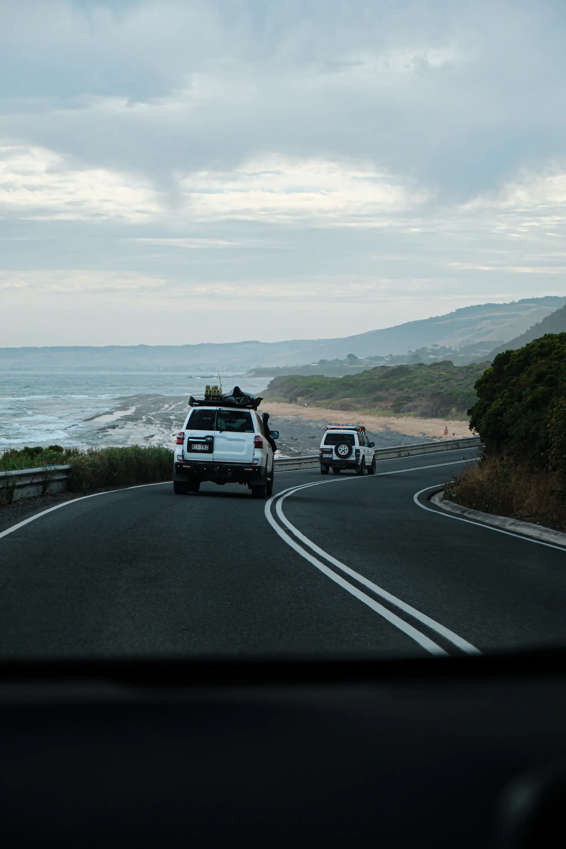 A motorcar on the coastal Great Ocean Road in Australia
