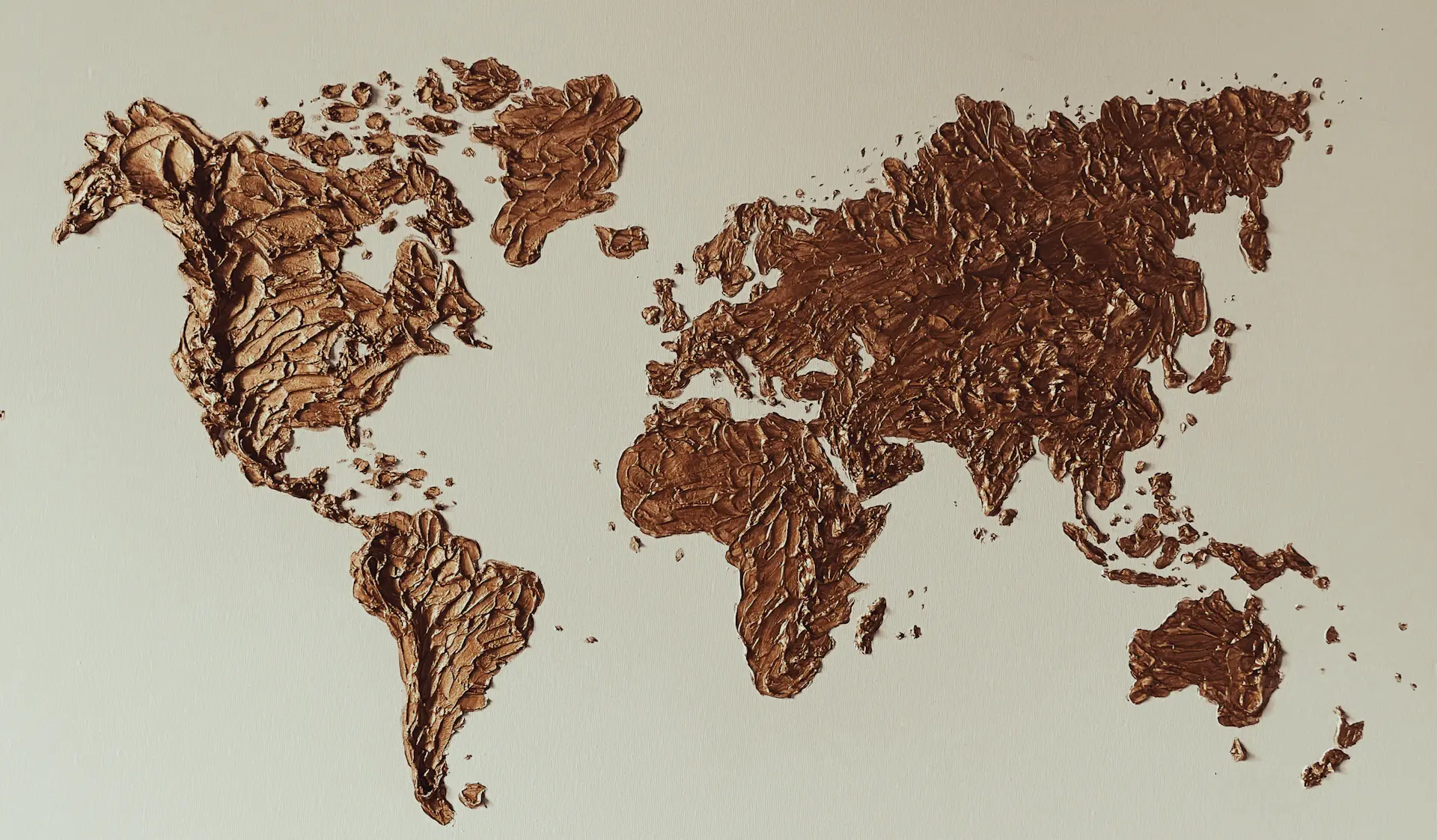 A minimal monochrome line-art map of the world
