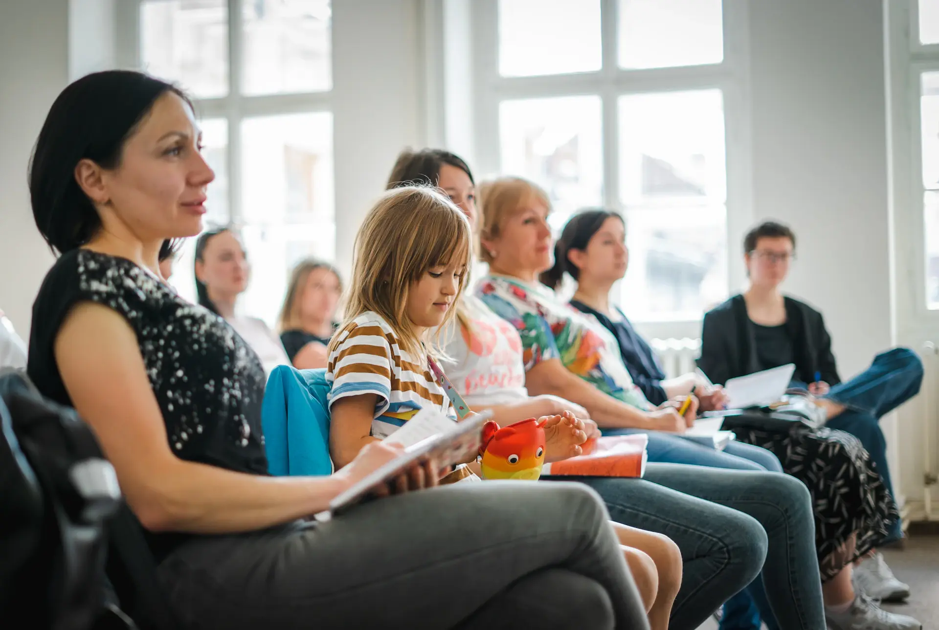 Families attending an information session