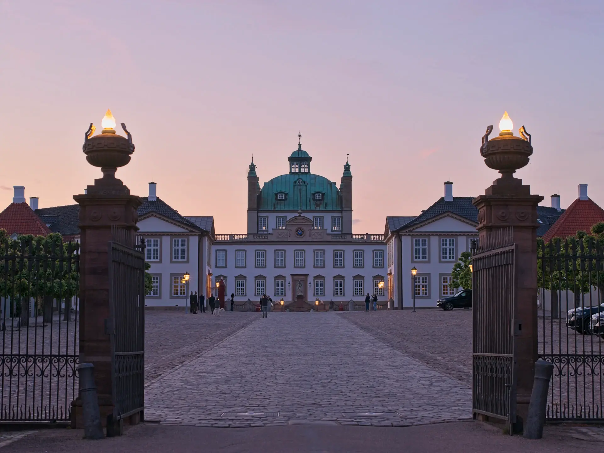 Palace facade illuminated at dusk