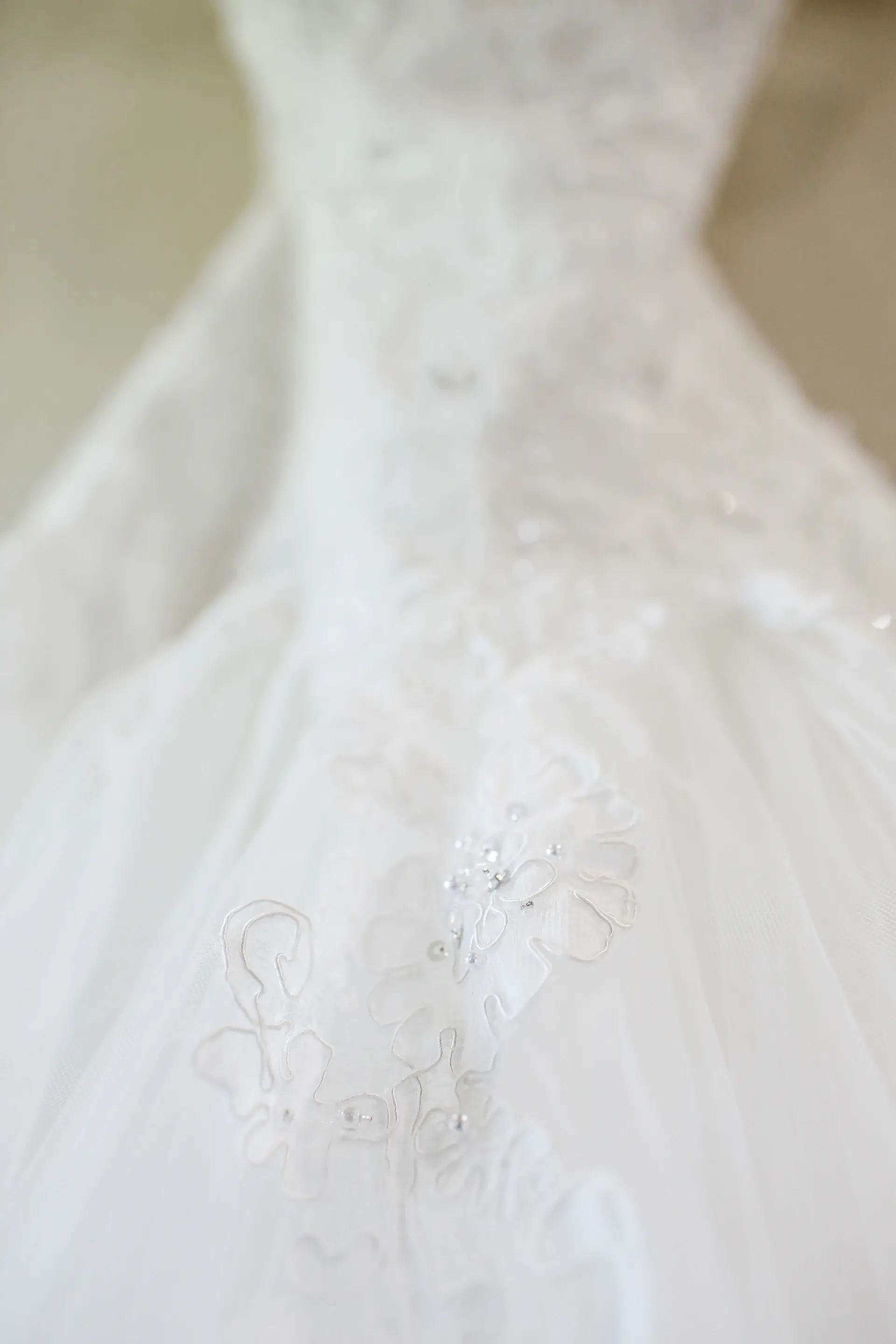 Detail of an embroidered wedding gown