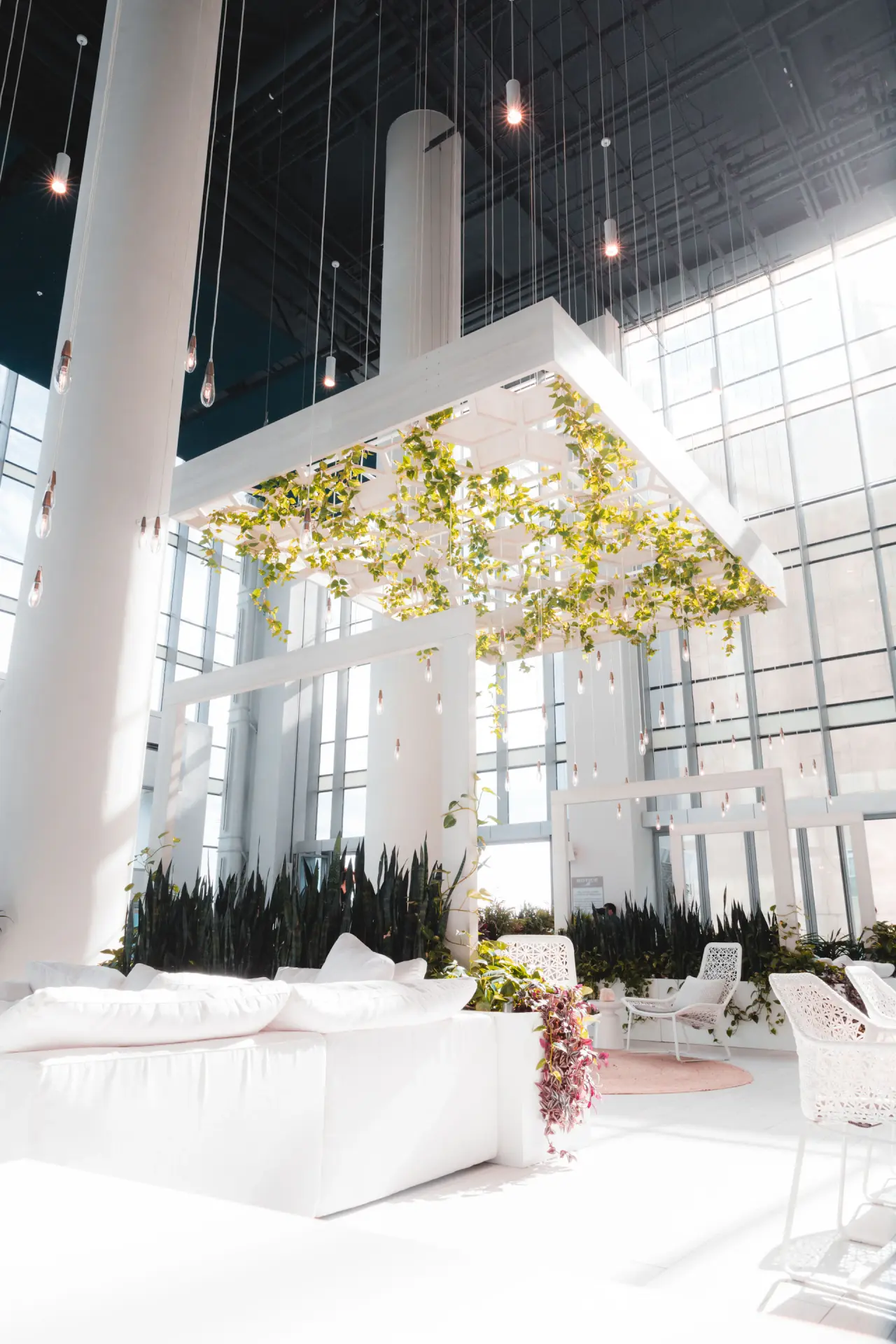 Tall rose installation in a gallery space
