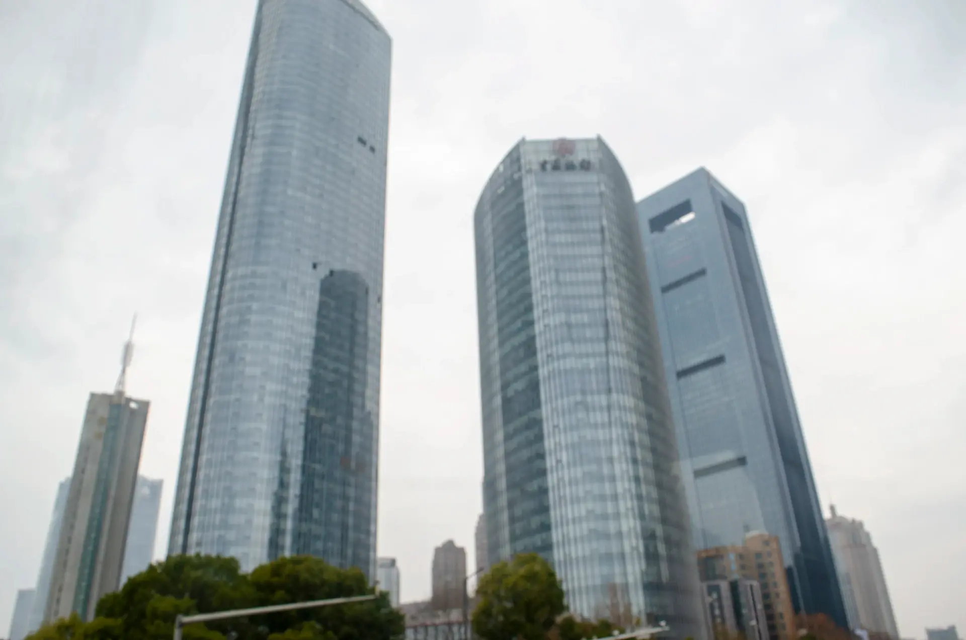 Young professional presenting in a modern Chinese business district