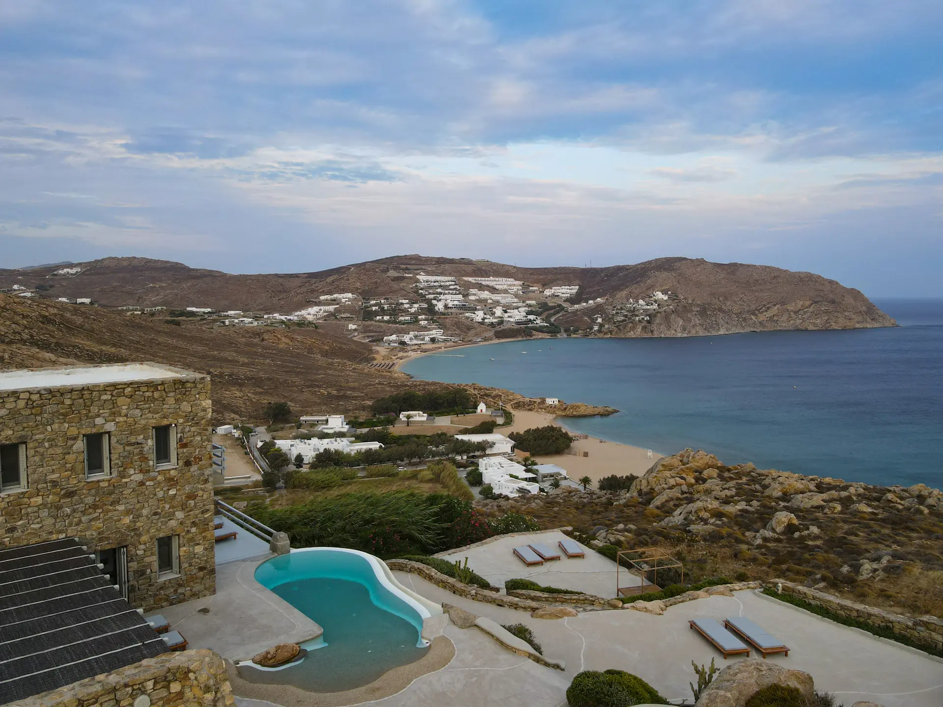 Whitewashed Mykonos villa above the sea
