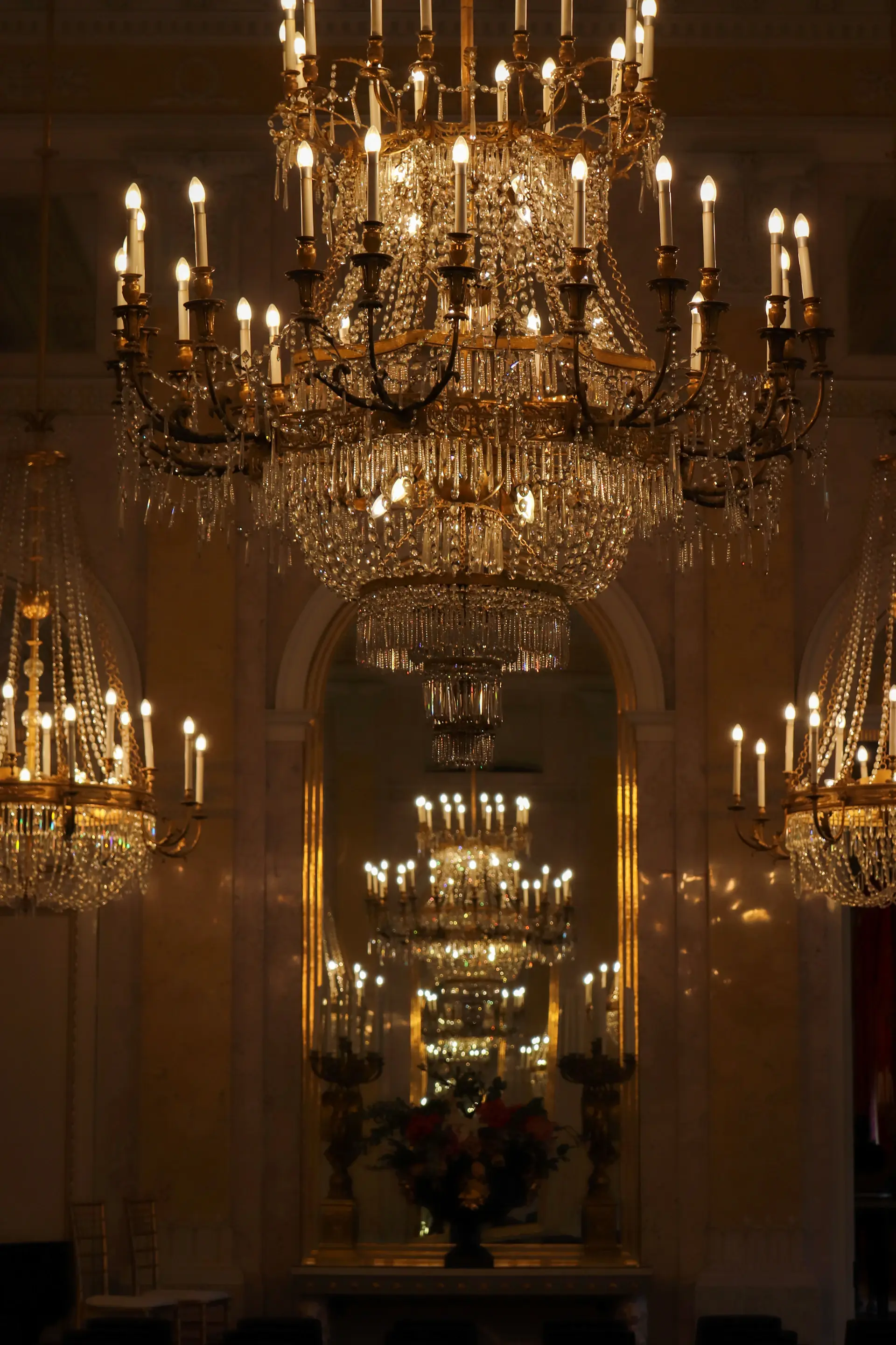 Grand ballroom under chandeliers
