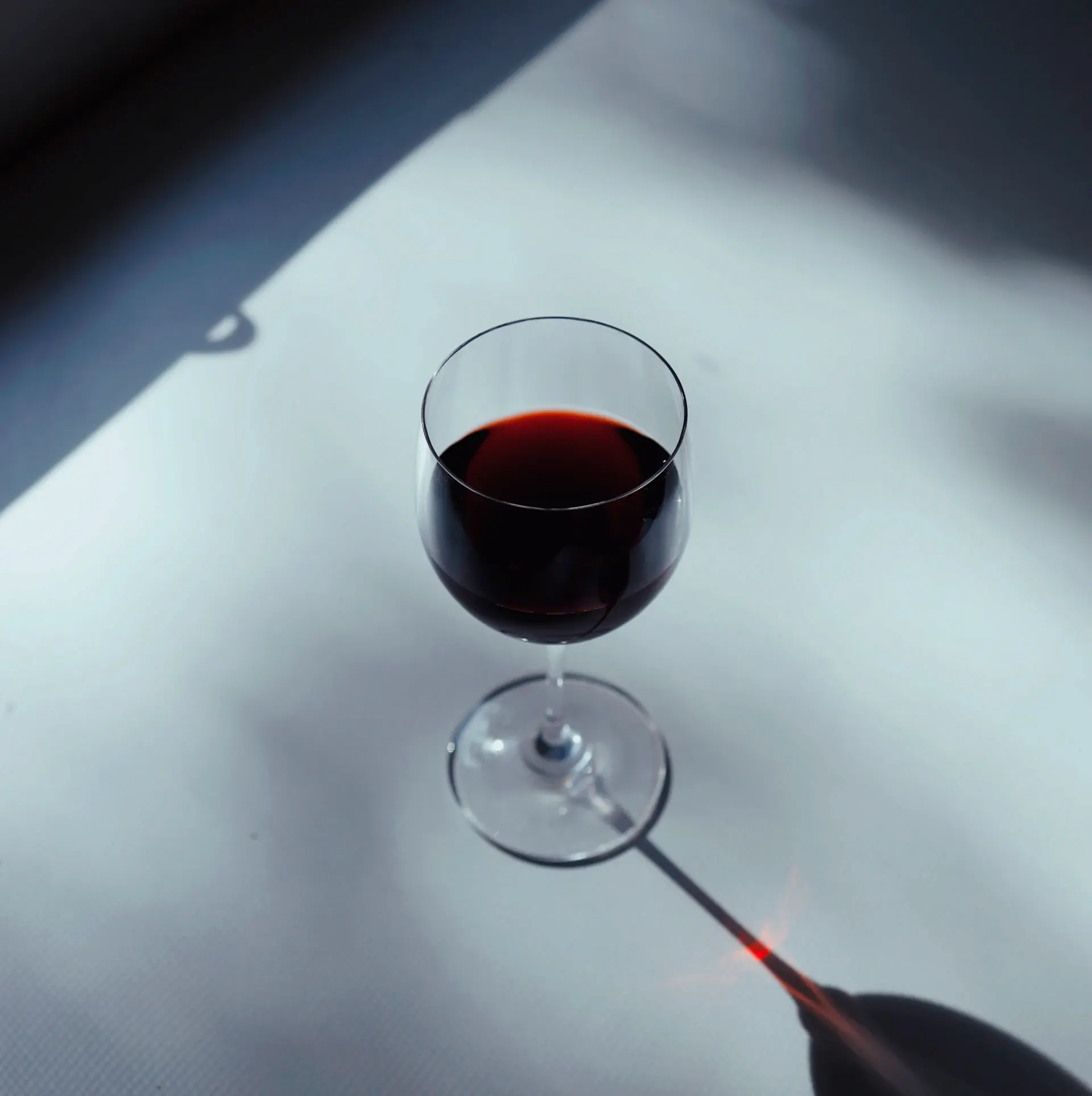 Amber spirit swirling inside a crystal tasting glass