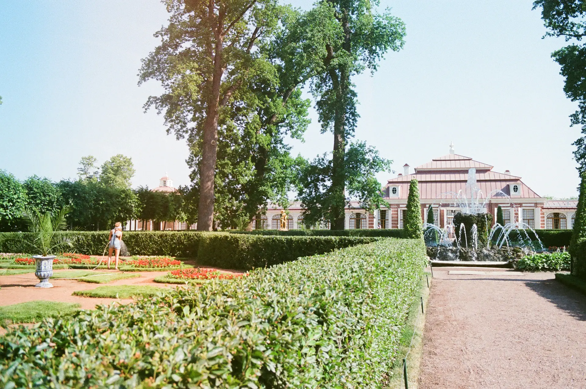 Couple sharing a quiet moment in the palace gardens