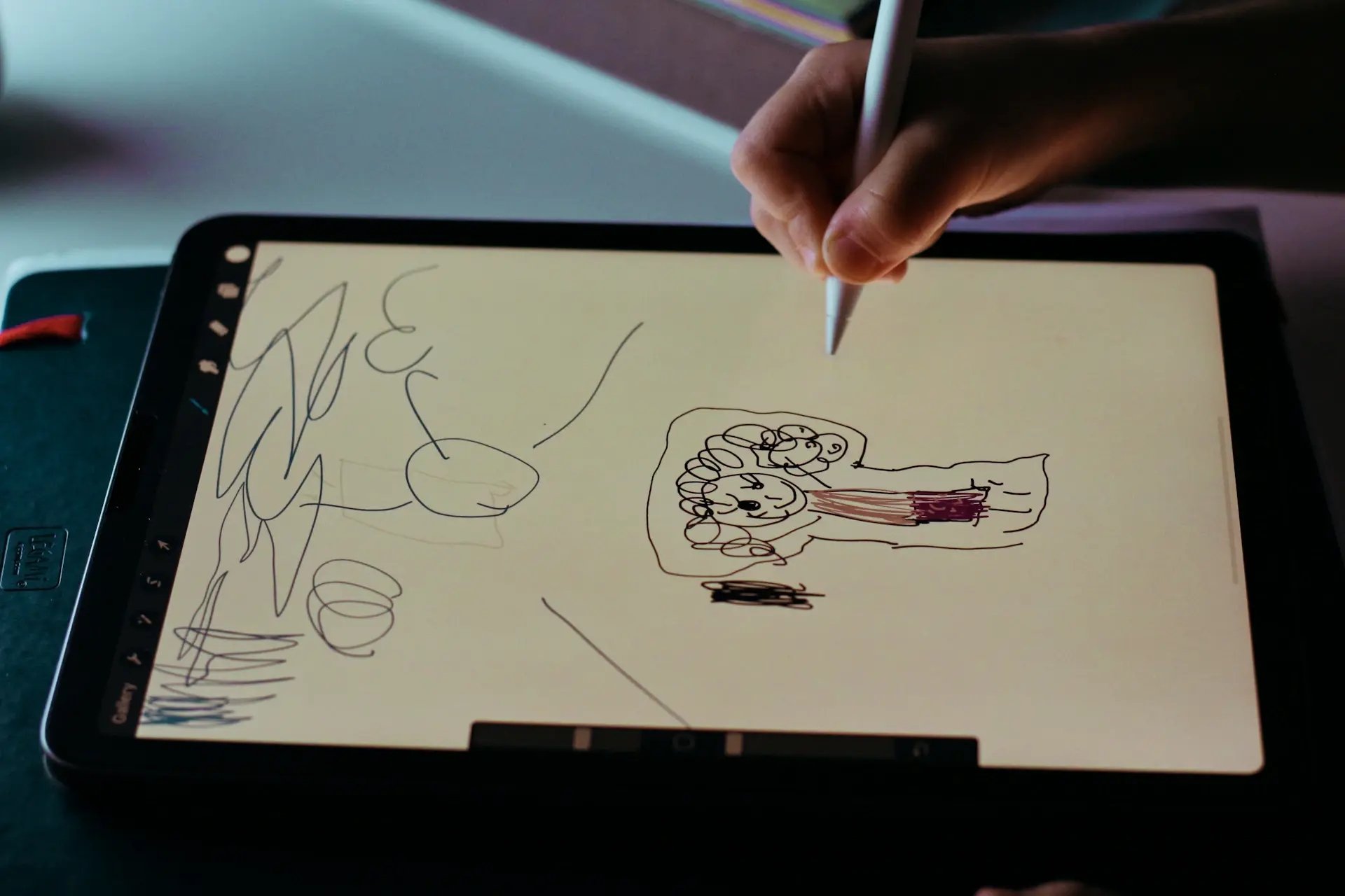 Designer sketching empty state illustrations on a tablet