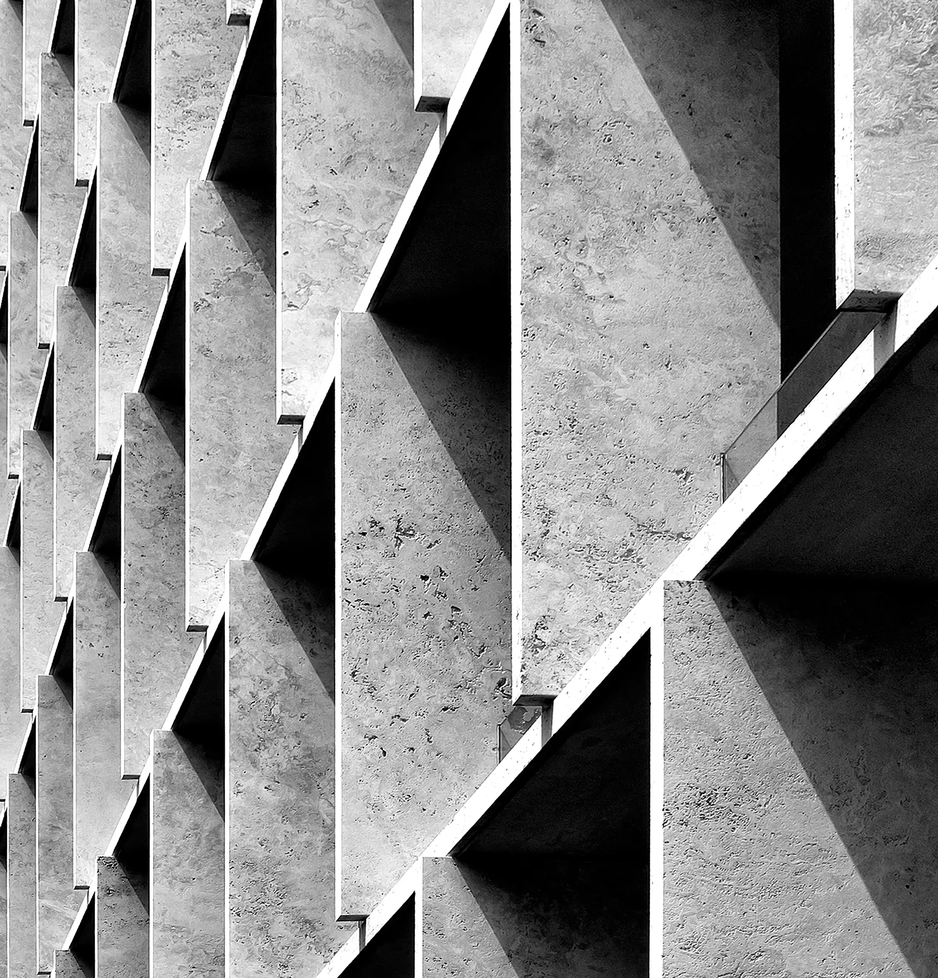 Minimal stone facade with deep shadow