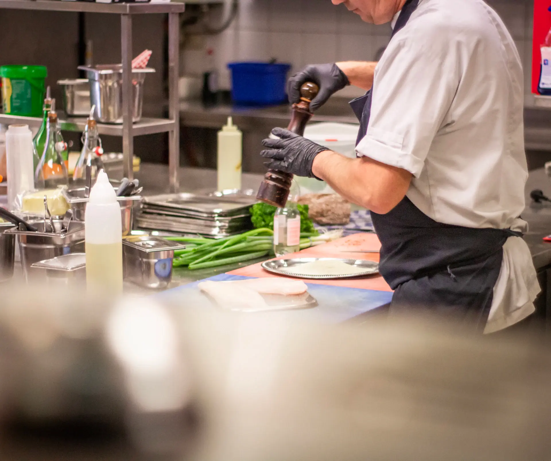 Chef plating a fine dining course