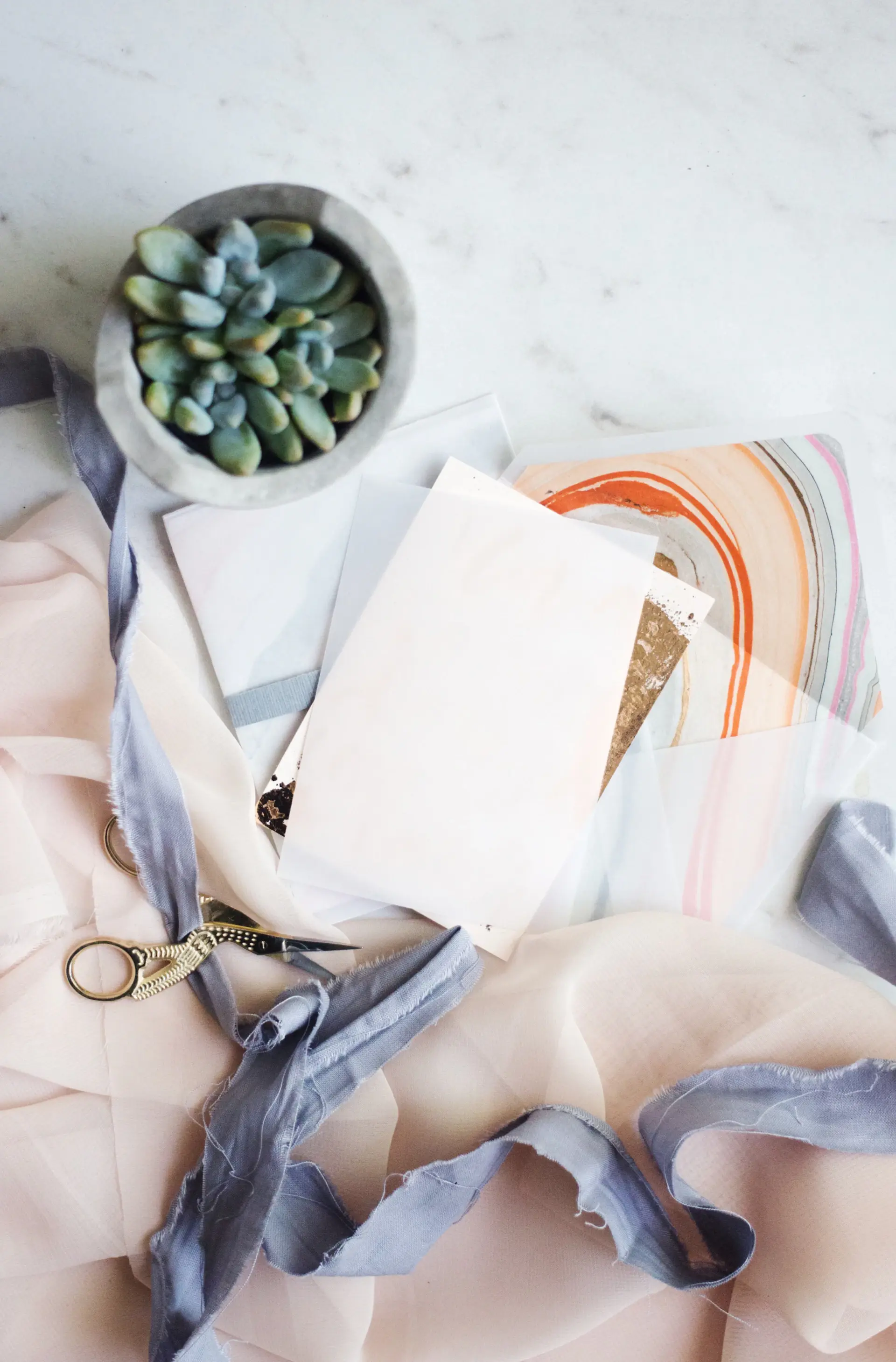 A planning desk with notes and fabric swatches