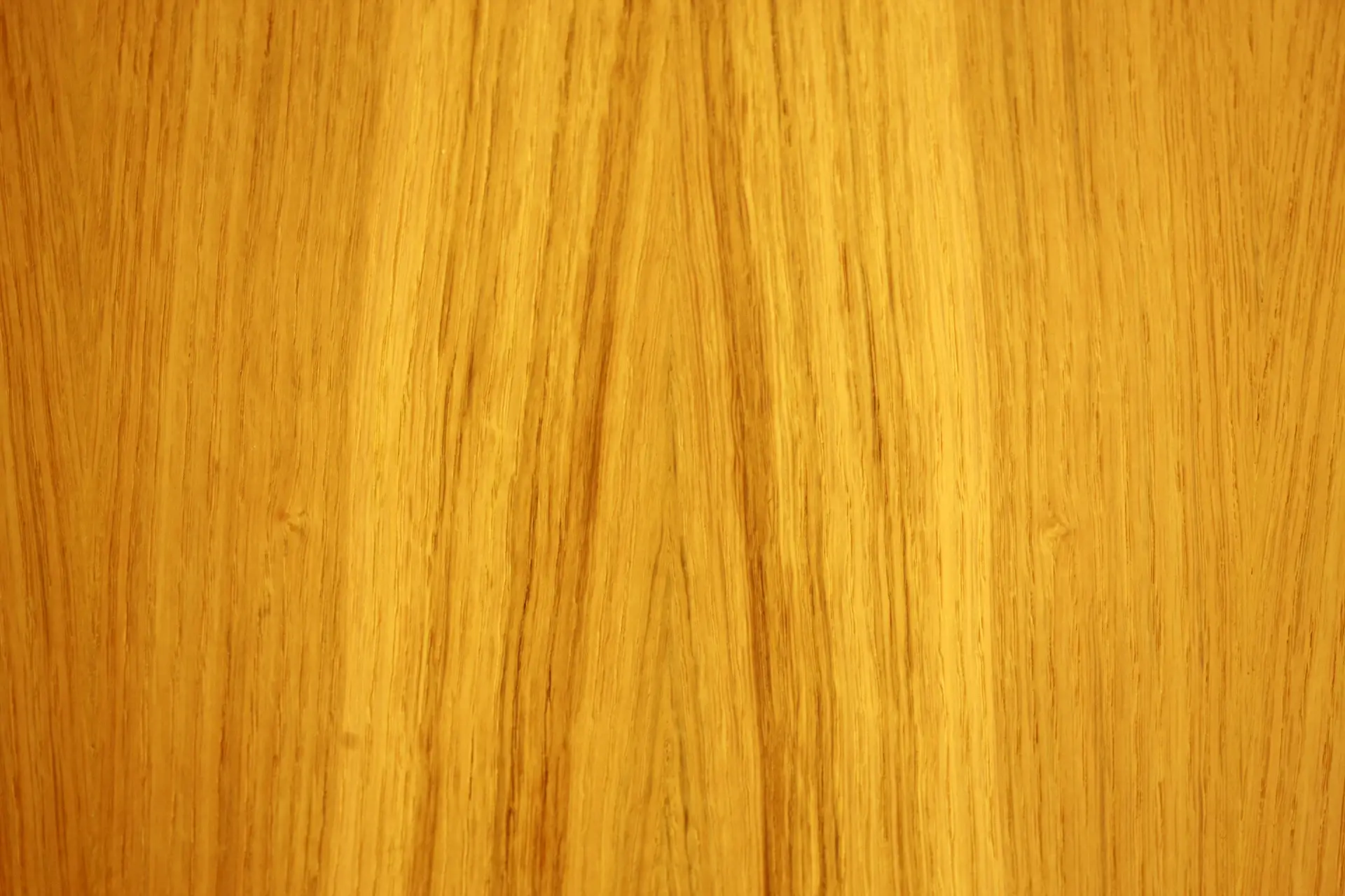 Macro of book-matched polished wood veneer grain