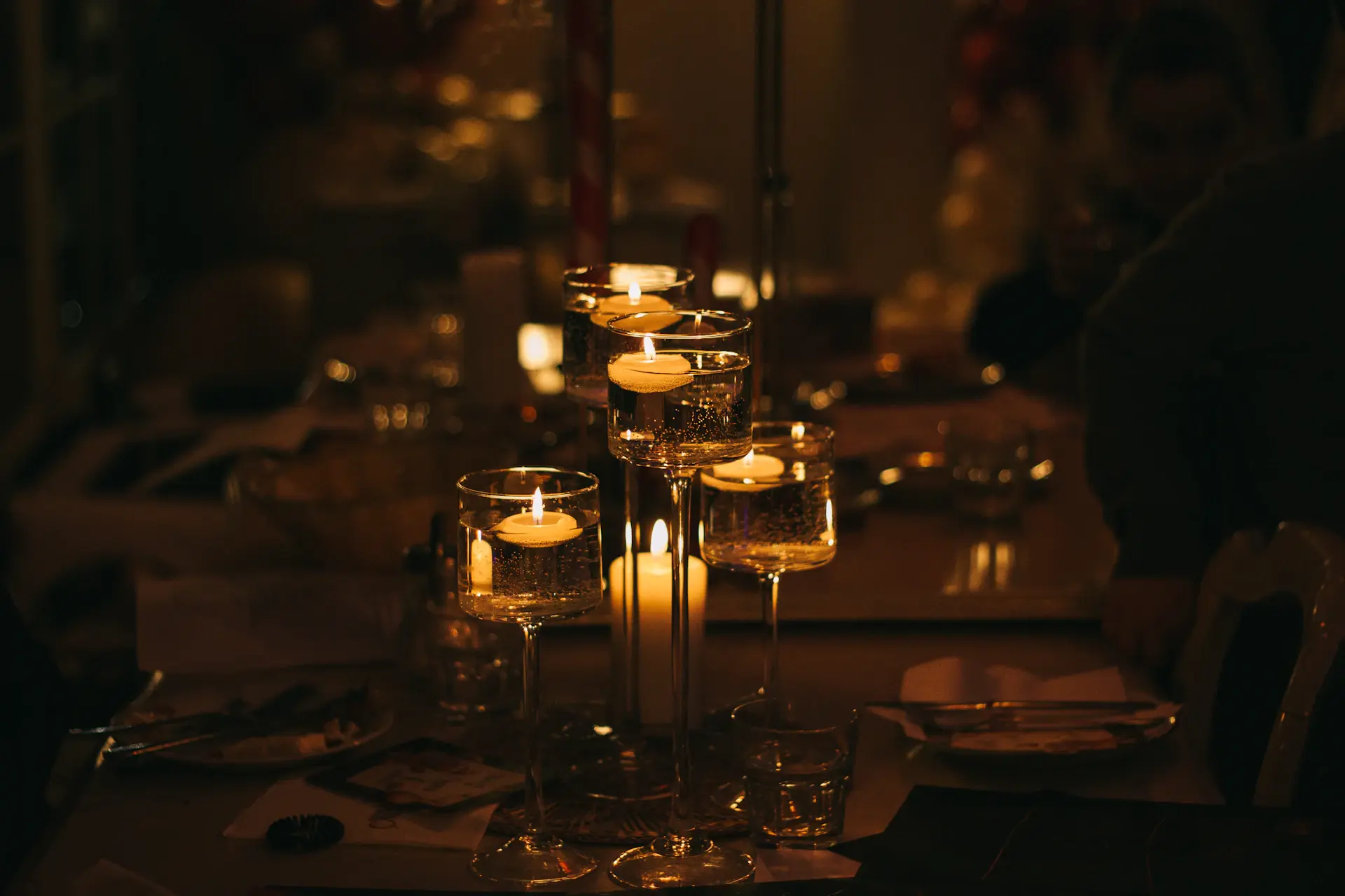 Intimate royal private dining chamber draped in deep burgundy and gold