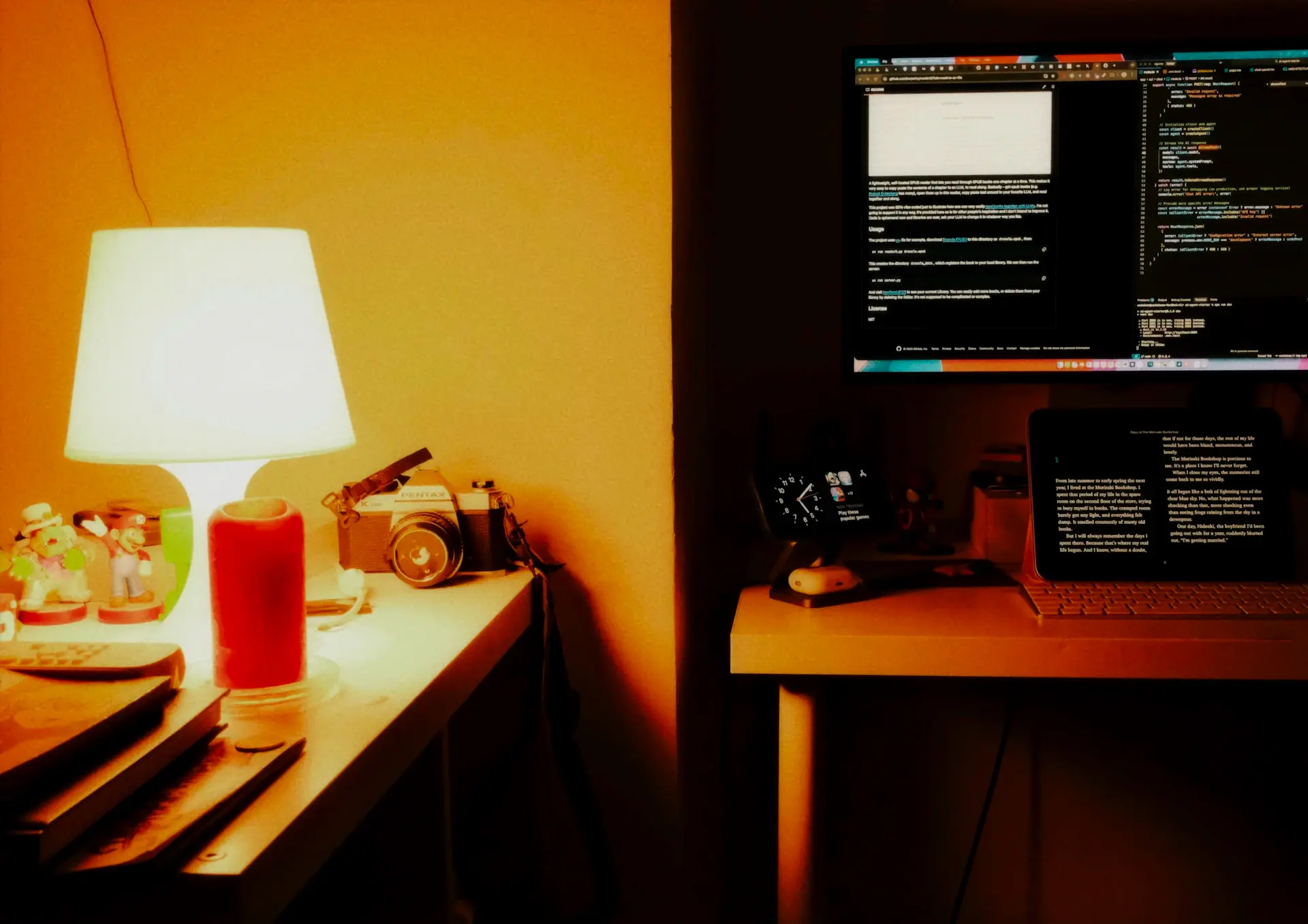 A cozy home workspace with a soft lamp