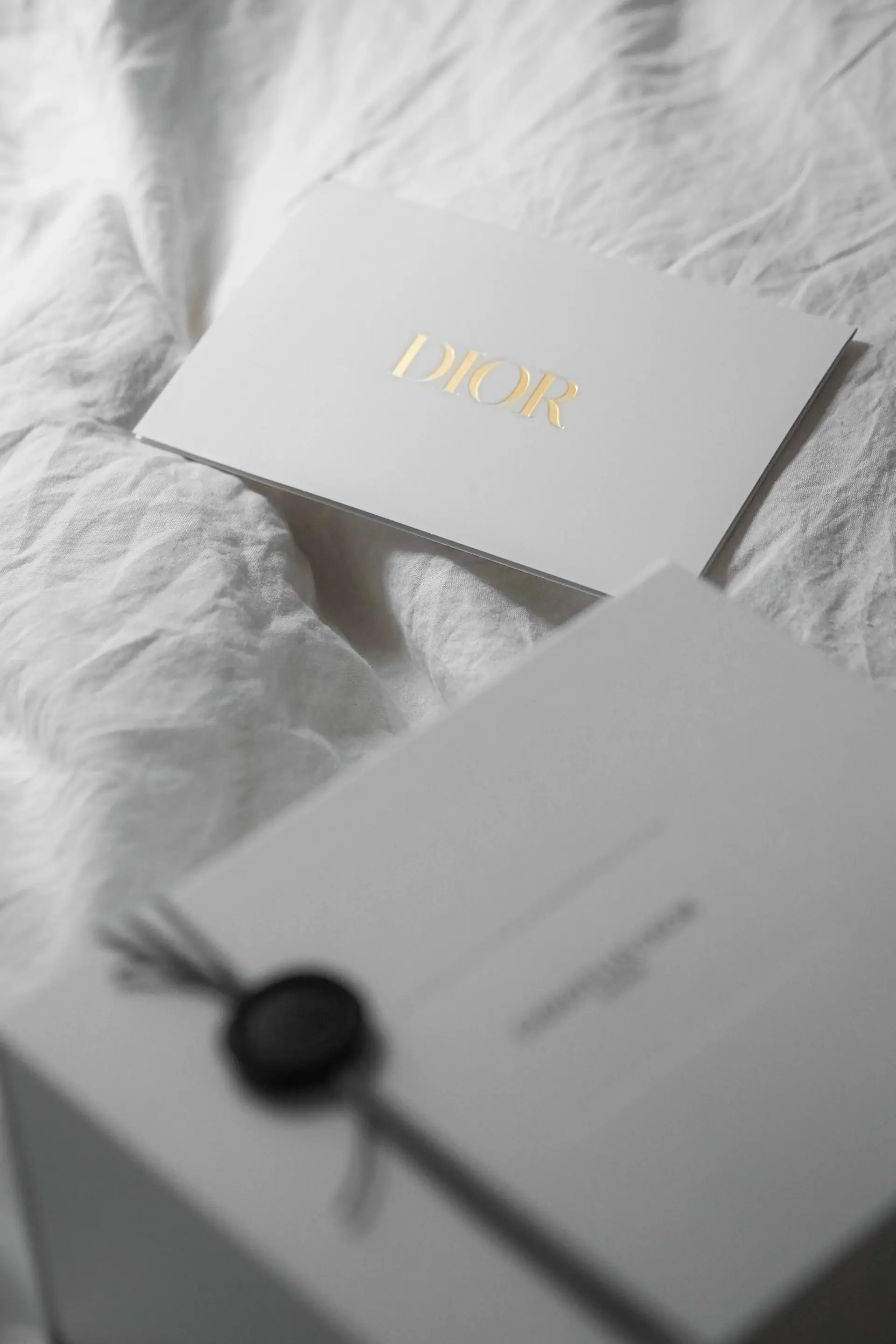 A planning desk with invitations and swatches