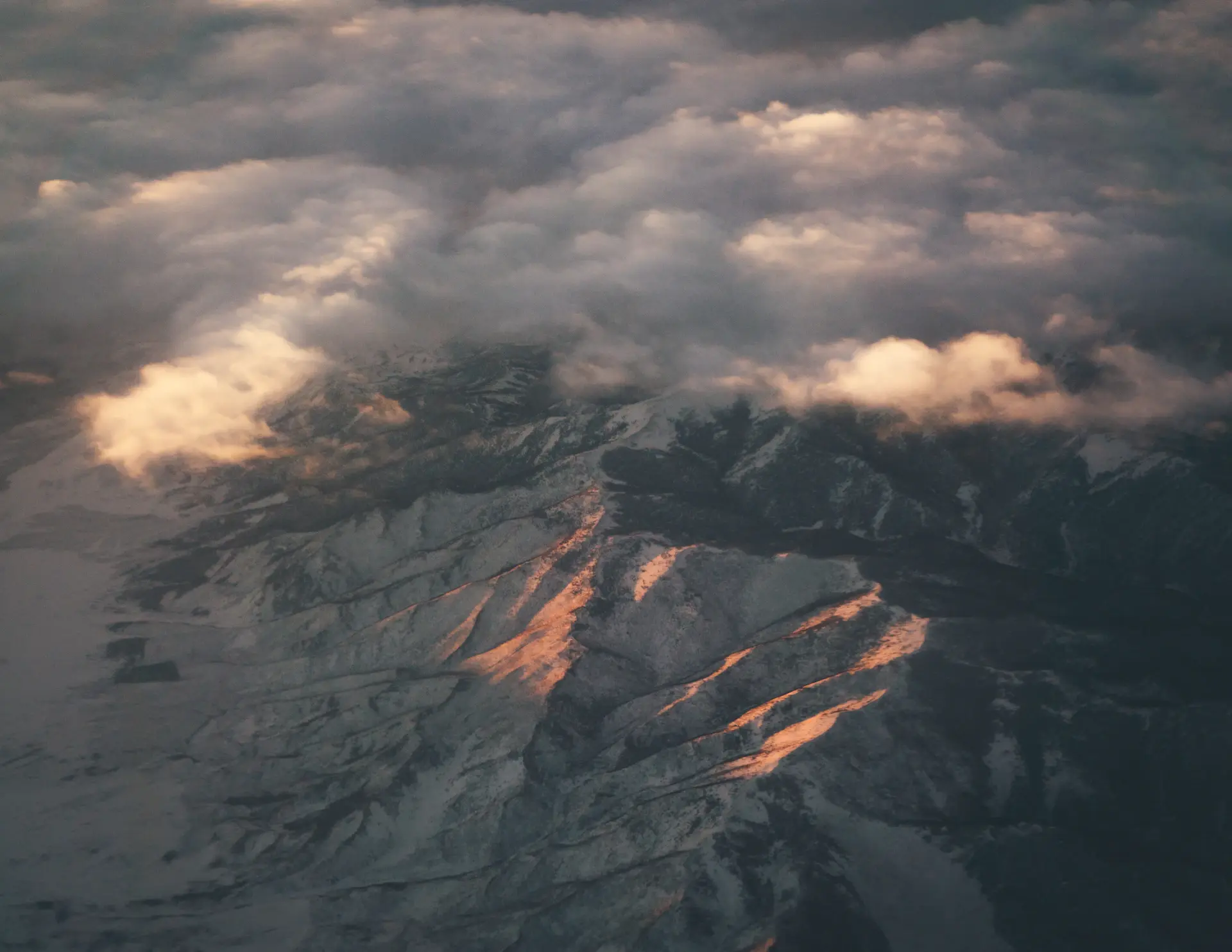 Wind sweeping across a vast Patagonian plain beneath storm light