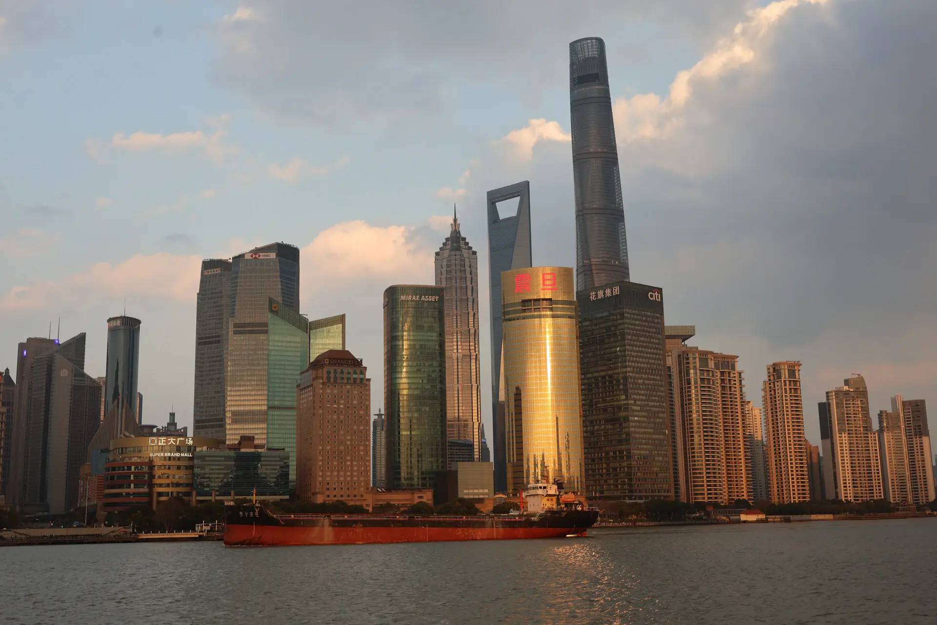Shanghai skyline at golden hour with the Bund waterfront