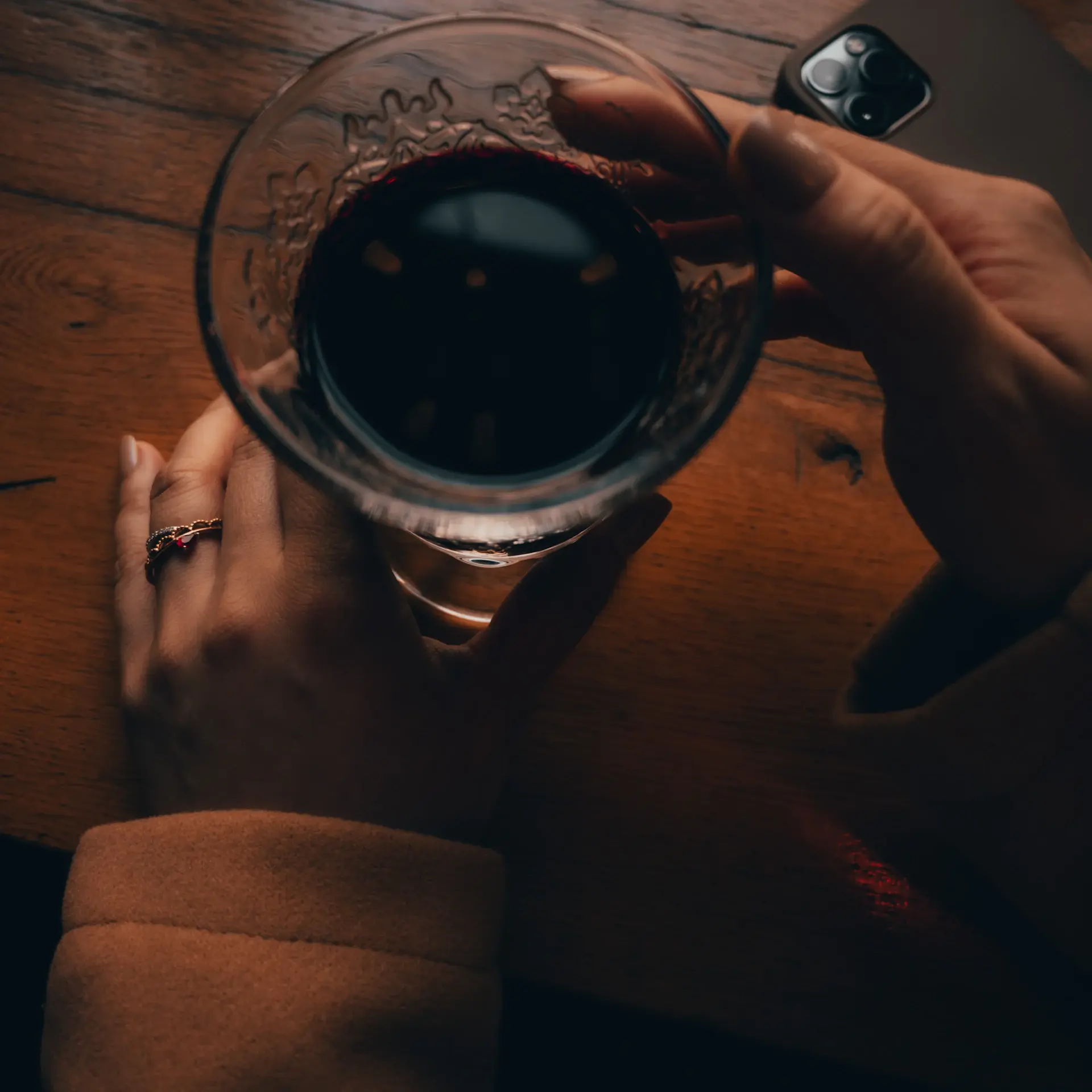First measured sip from a fine tasting glass