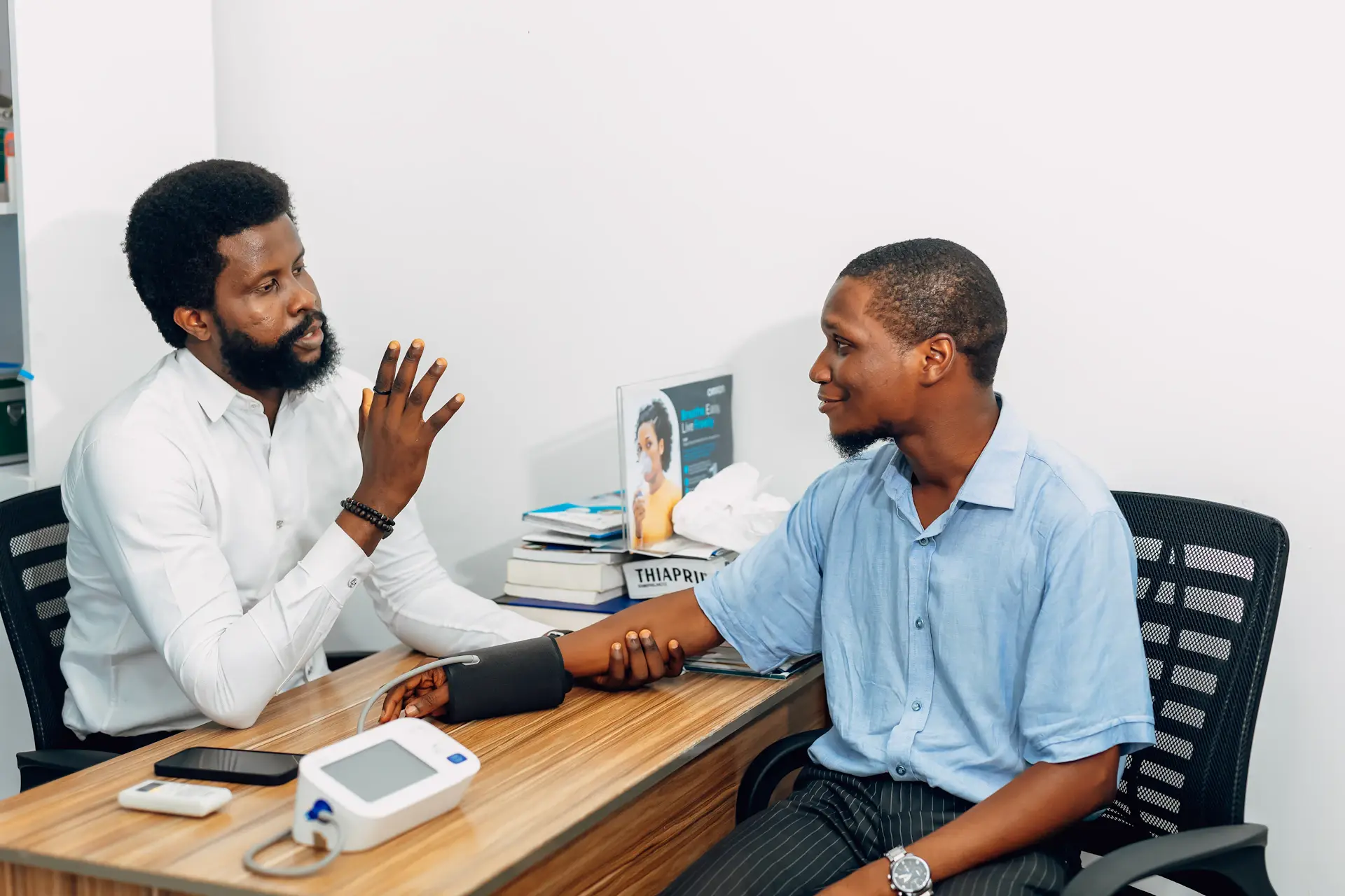Physician in quiet consultation with a client