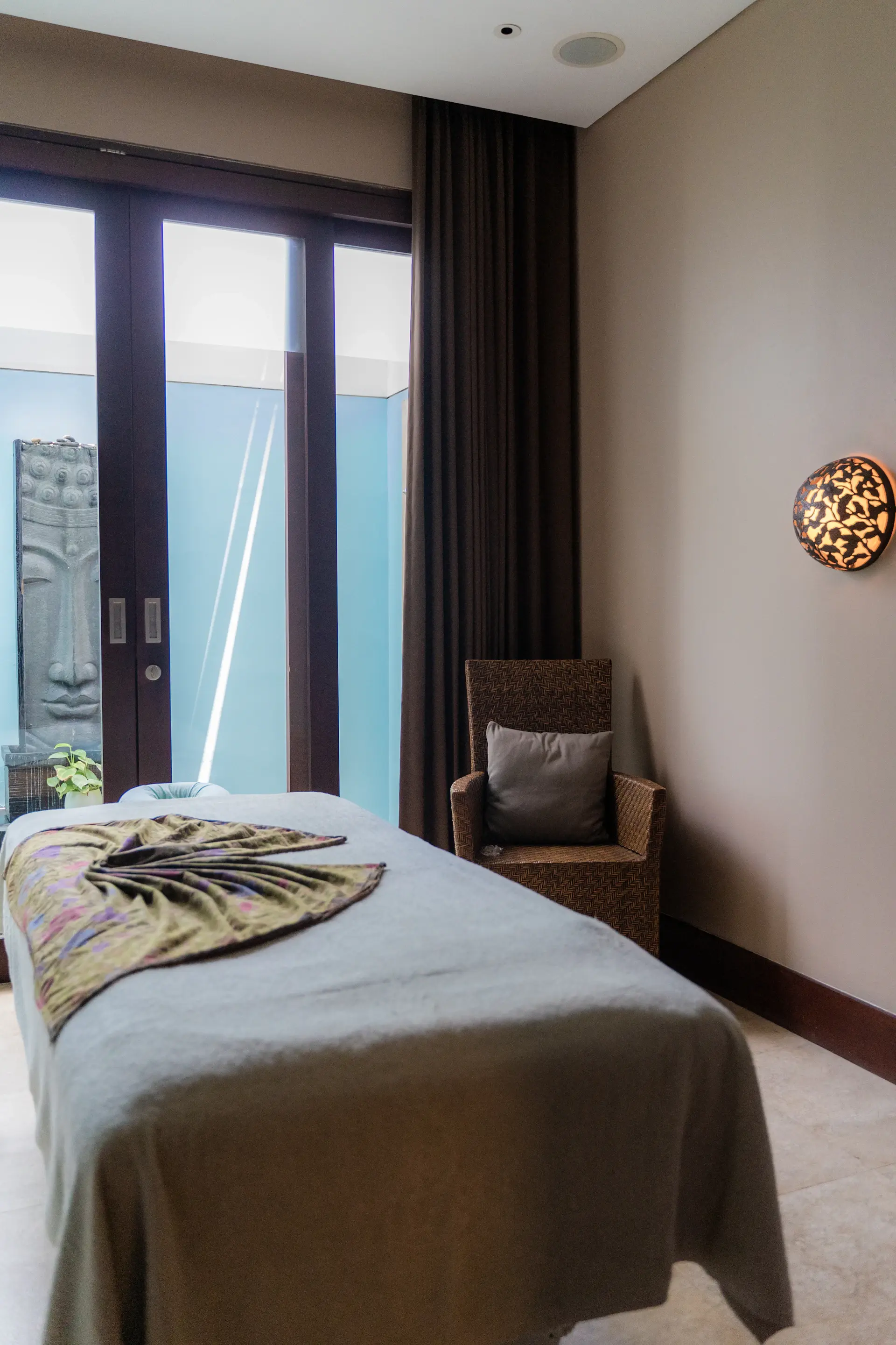 Wellness recovery suite overlooking calm gardens