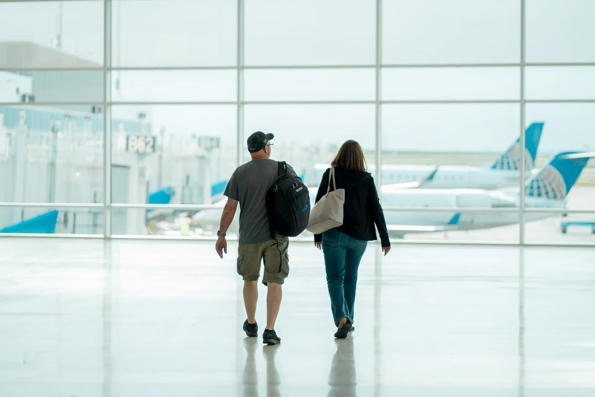 Student arriving at the airport with luggage