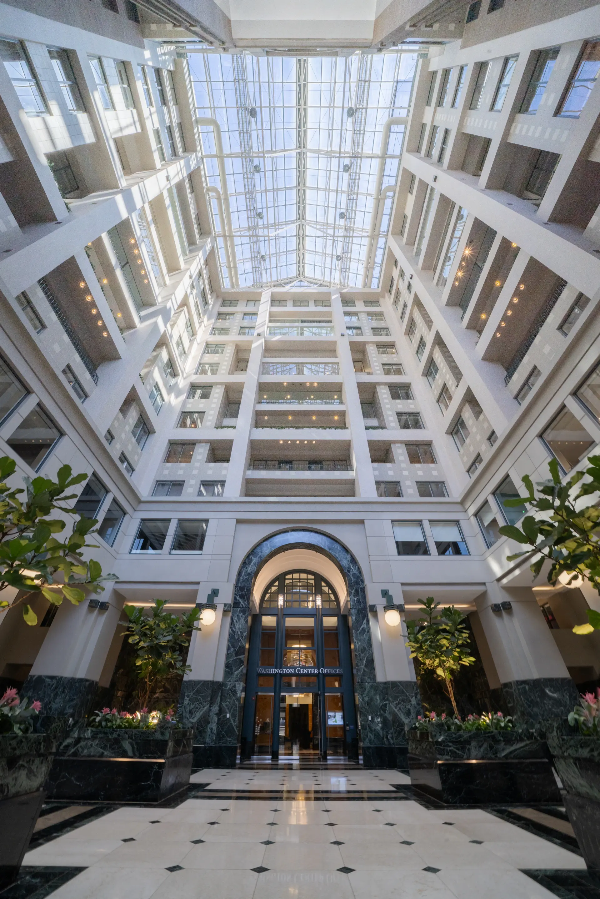 The Marble Atrium with stone columns and a glass dome