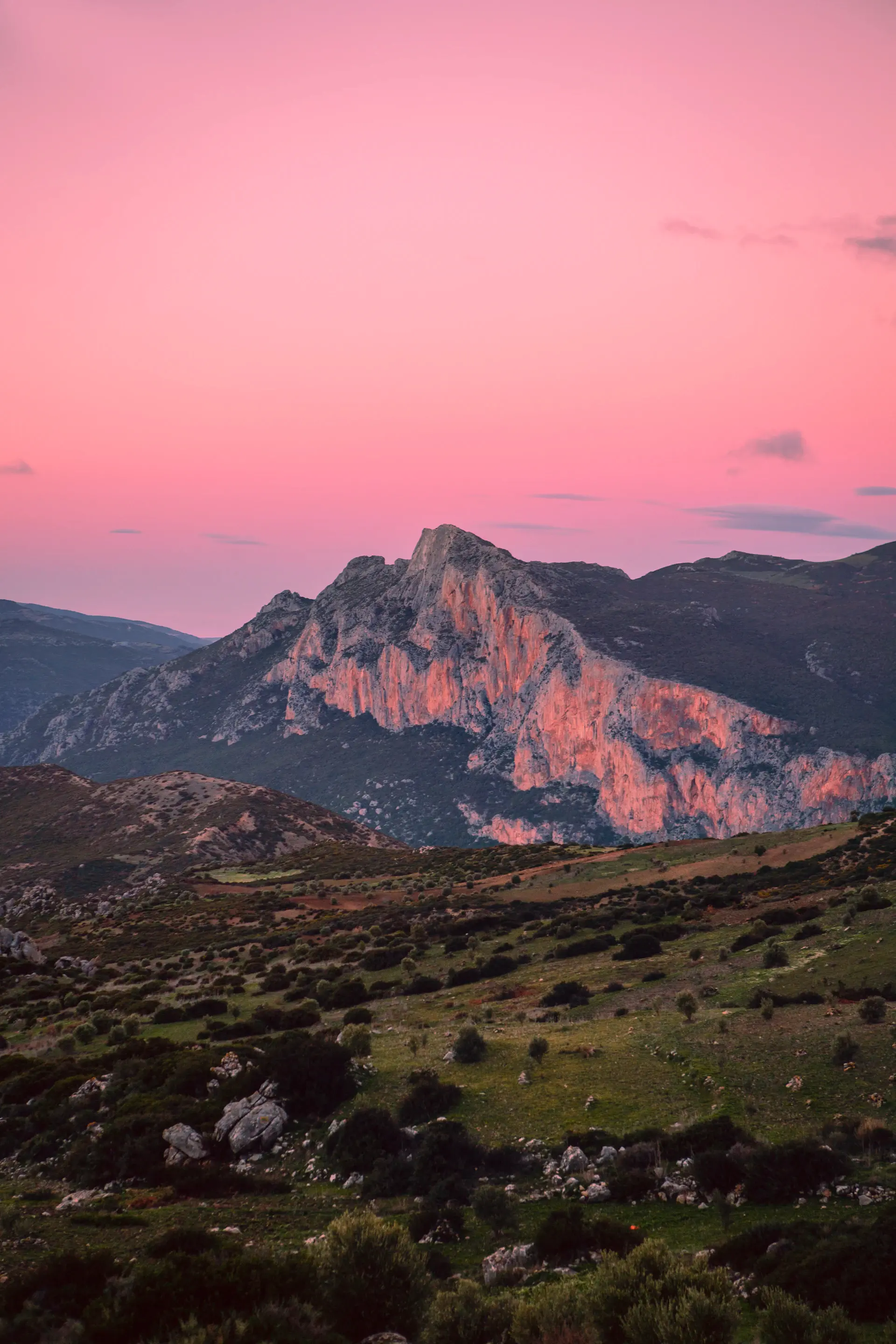 Jagged limestone peaks catching the first pink light