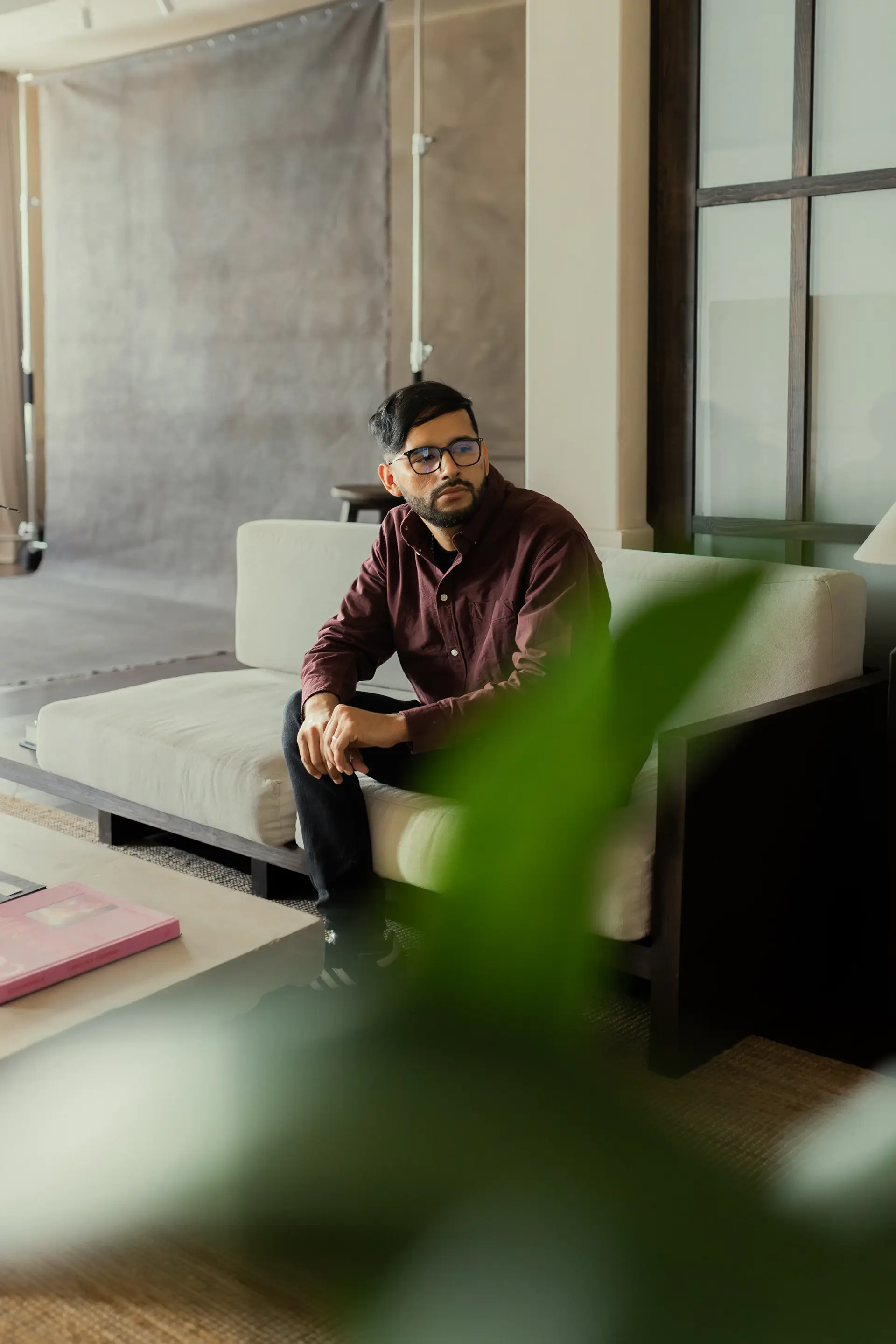 Designer at work in a bright studio