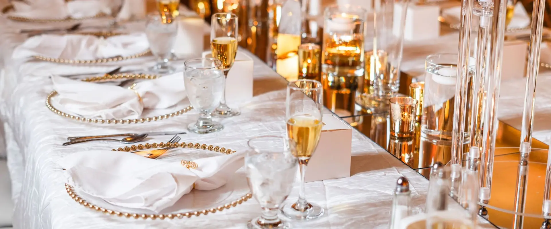 Grand candlelit ballroom set for a royal wedding banquet