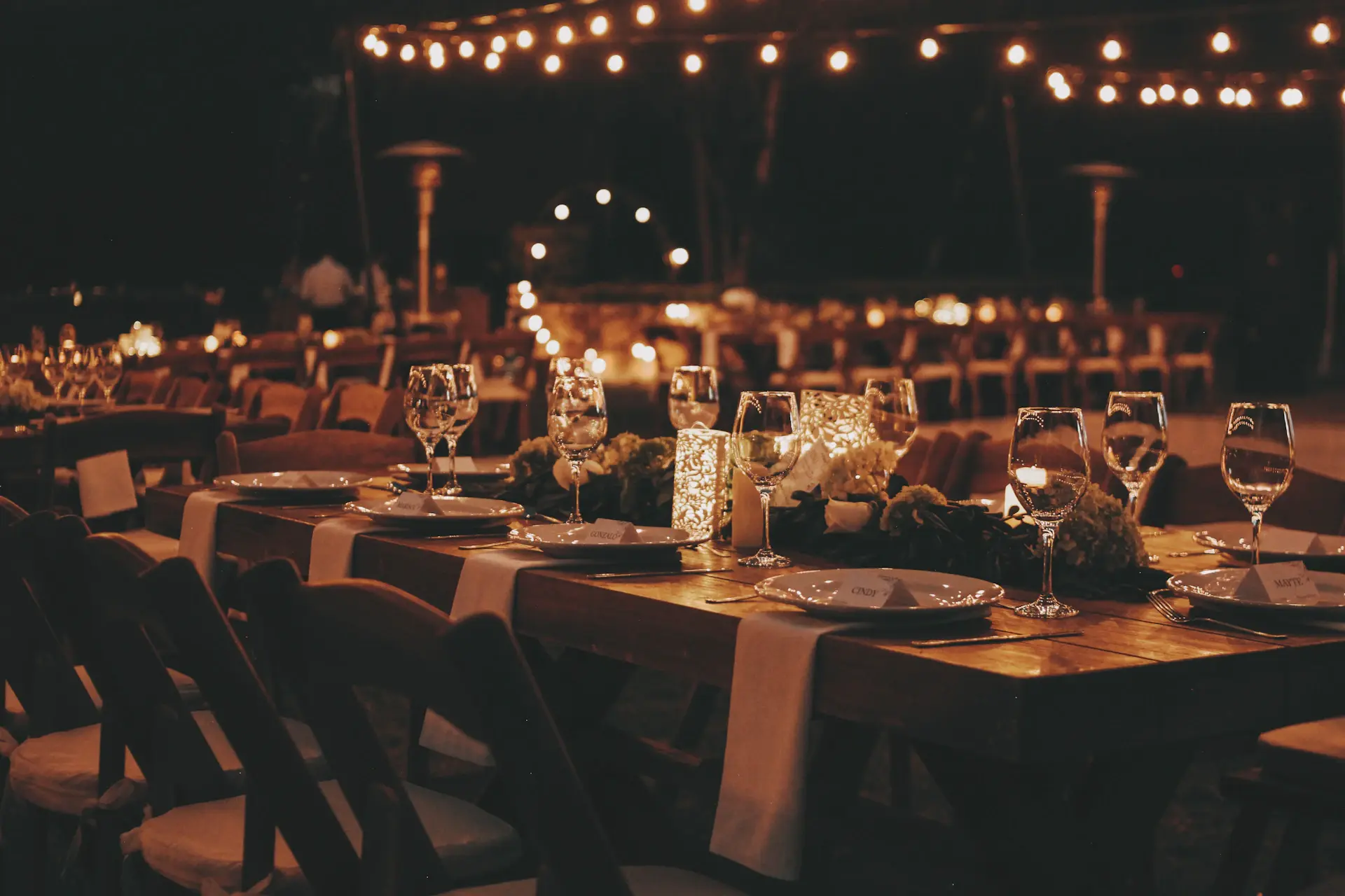 A candlelit table at a luxury wedding reception